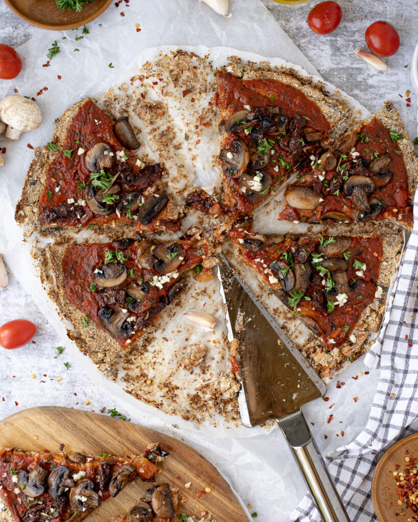 Vegan Cauliflower Pizza Crust with Garlicky Mushroom & Tomato Topping