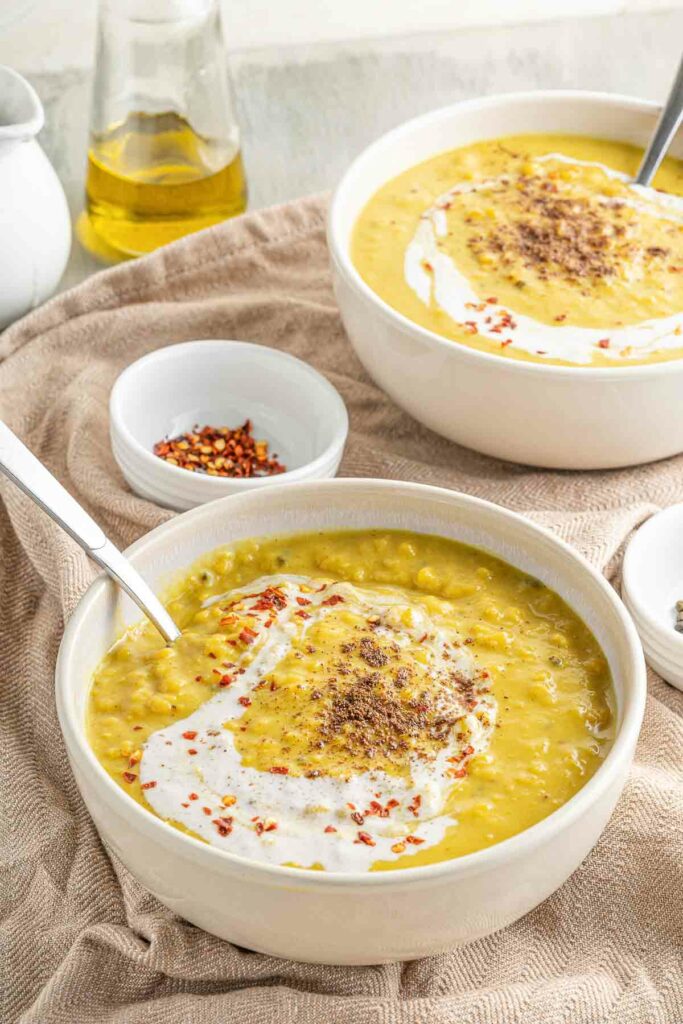 Two bowls of lentil dahl soup.