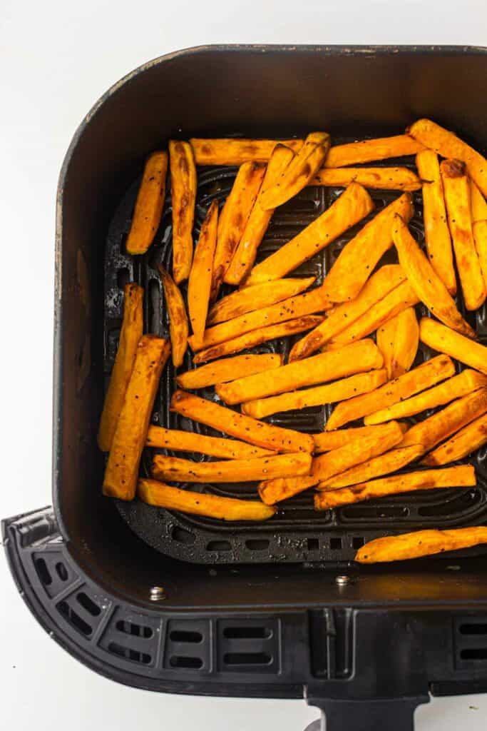 Sweet potato fries in an air fryer.
