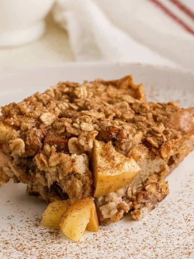 A slice of apple oatmeal on a plate.