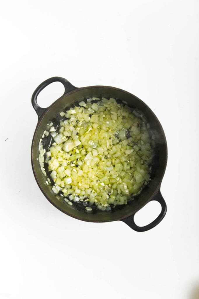 A pot with garlic and onion.