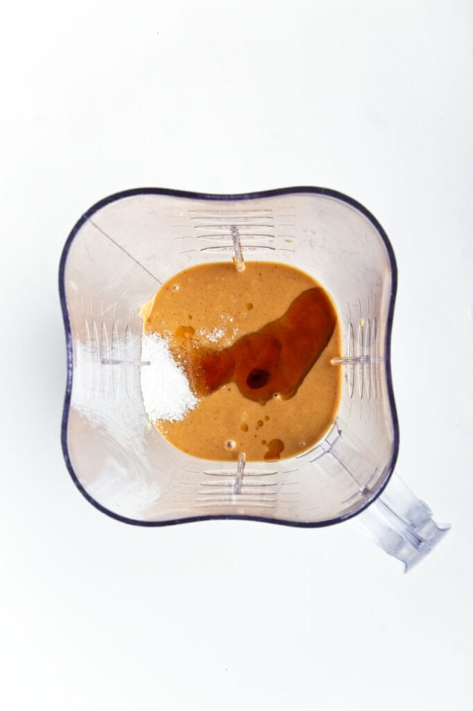 Top view of a blender jar with a blended liquid mixture inside.