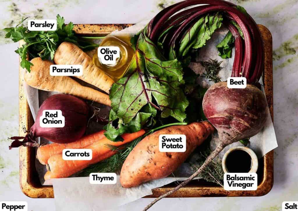 Tray with raw vegetables and seasonings&mdash;parsley, parsnips, red onion, carrots, thyme, sweet potato, beet&mdash;plus olive oil, balsamic vinegar, salt, and pepper. Perfect for making Air Fryer Roasted Root Vegetables; all ingredients are clearly labeled.